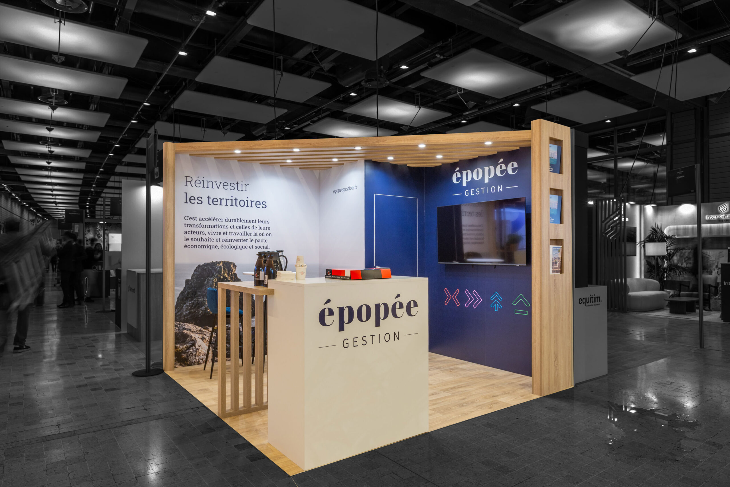 Vue de face du stand sur-mesure Epopée Gestion au salon Patrimonia 2025.